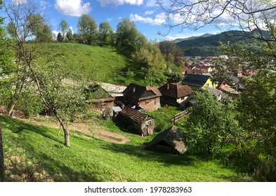 Viseu de Sus, Maramures, Romania: May 15 2021: Traditional houses build by Germans  community in a little town from Romania