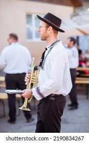 Viseu De Sus, Maramures, Romania, 12 August 2022, German Marching Band Trumpeter Preparing