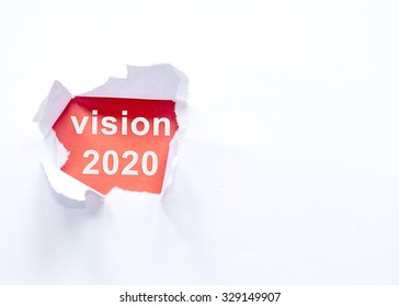 Vision 2020 Goal Written Behind A Torn Paper