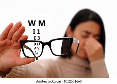 Vision disorder - vision problems - blurred vision. Young woman with glasses.