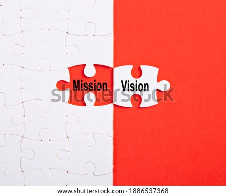 VISION and MISSION using jigsaw puzzles. Selective focus.