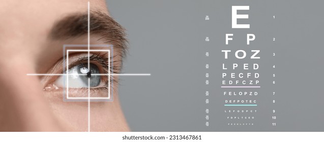 Vision test chart and laser reticle focused on man's eye against light grey background, closeup. Banner design - Powered by Shutterstock