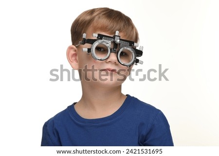 Similar – Child with magnifying glass