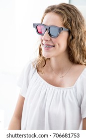 Vision Therapy. Young Female Patient With Red Green Glasses