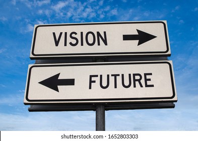 Vision Vs Future. White Two Street Signs With Arrow On Metal Pole With Word. Directional Road. Crossroads Road Sign, Two Arrow. Blue Sky Background. Two Way Road Sign With Text.