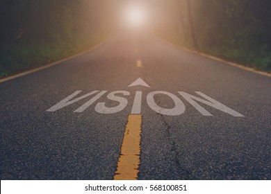 Vision written on road