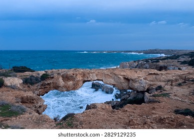 visiting the Crow's Arch Stonebridge during twilight on the south part of Cyprus