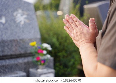 visiting a grave on the equinoctial week Japanese custom - Shutterstock ID 1822643870