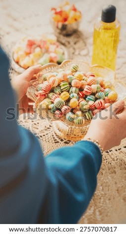 Visiting relatives and offering candy during Eid al-Fitr celebration