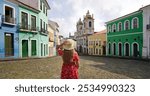 Visiting Salvador de Bahia, Brazil. Panoramic banner view of tourist girl in Pelourinho historic center of Salvador de Bahia, Brazil.