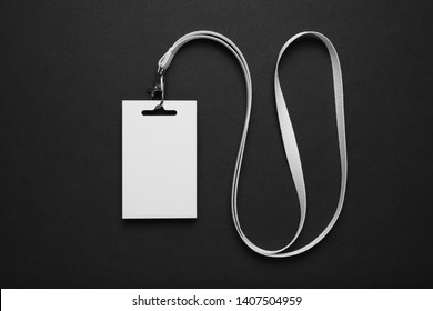 Visitor name tag, id card mockup on black background. - Shutterstock ID 1407504959