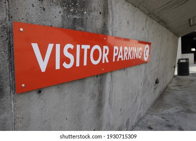 Visitor Parking Sign On Concrete Wall