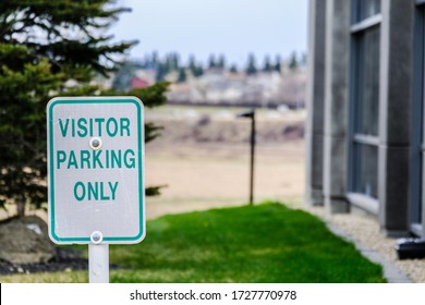 Visitor Reservered Parking Sign In Office Car Lot