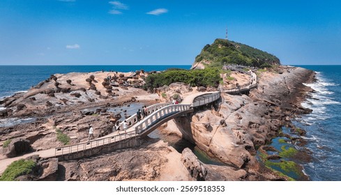 Visitors enjoy Yehliu Geoparks stunning coastal views and unique rock formations - Powered by Shutterstock - Get 15% off with code: PIKWIZARD15