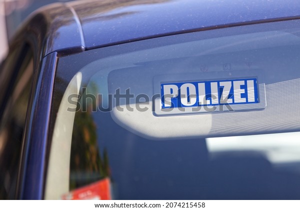 Visor with a German police\
sign.