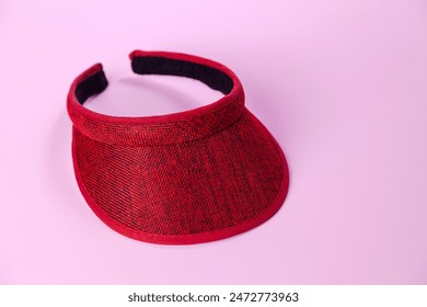 Visor on pink background. Visor concept. Feminine product concept. Copy space. - Powered by Shutterstock