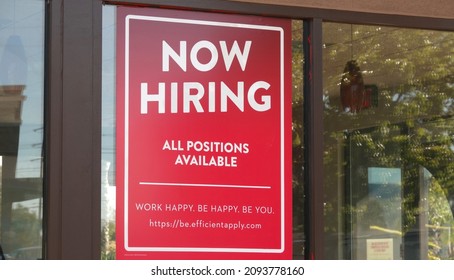 Vista, CA USA - December 17, 2021: Large "Now Hiring All Positions" sign in a restaurant window                               