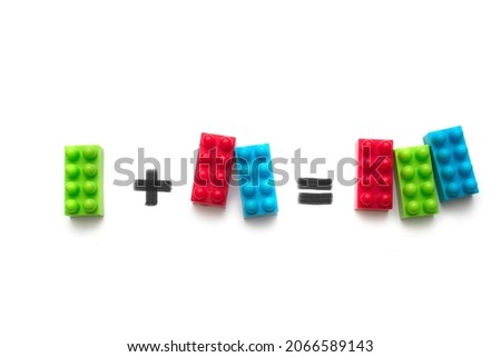 visual describing simple math addition with game blocks