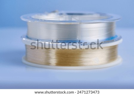visual differences between fishing lines made of nylon and fluorocarbon are visible to the naked eye
