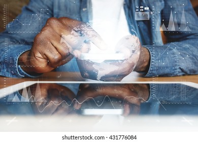 Visual Effects. Graphic Icons. People And Future Technology Concept. Cropped Shot Of African American Young Man In Denim Jacket, Touching Electronic Gadget With Reflective Touchscreen Surface