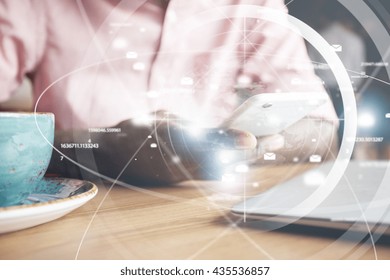 Visual effects. Worldwide connection interface. Close up shot of African man's hands holding futuristic electronic device. Black office worker typing a message on smart phone at a coffee shop - Powered by Shutterstock - Get 15% off with code: PIKWIZARD15