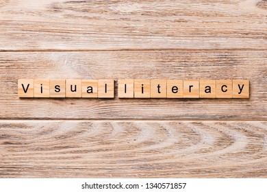 Visual Literacy Word Written On Wood Block. Visual Literacy Text On Wooden Table For Your Desing, Concept.