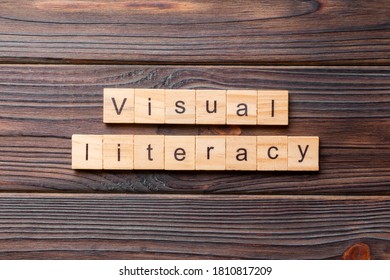 Visual Literacy Word Written On Wood Block. Visual Literacy Text On Cement Table For Your Desing, Concept.