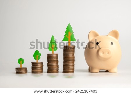 A visual metaphor for financial growth featuring coin stacks and a piggy bank with tree symbolizing increasing investments.