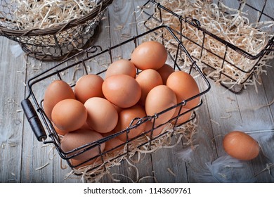 Visual metaphor/proverb: Don't put all of your eggs in one basket with whole eggs.