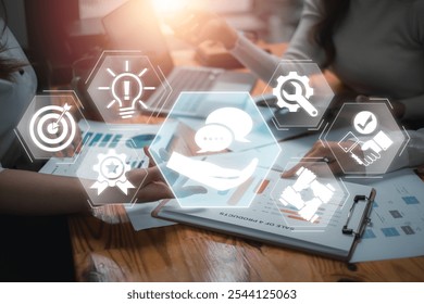 Visual representation of advice and strategy with digital icons overlaying a business meeting setting.