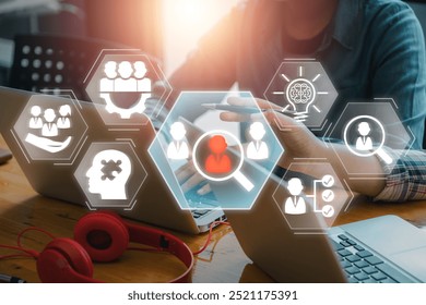 Visual representation of digital onboarding with team collaboration, technology icons, and laptops, highlighting modern business processes. - Powered by Shutterstock