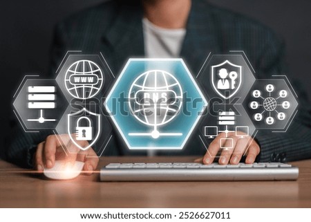 Visual representation of the Domain Name System (DNS) concept with digital icons and hands typing on a keyboard.