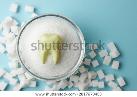 Visual Representation Emphasizing Risks Of Dental Decay Involving Tooth And Sugar. Bad teeth