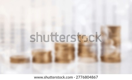 A visual representation of financial growth, featuring stacks of coins arranged to depict increasing wealth and successful investment strategies. The image symbolizes prosperity and economic progress.