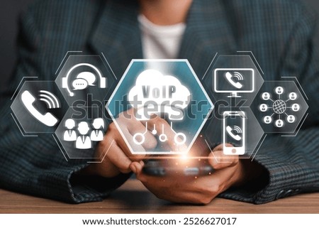 A visual representation of Voice over Internet Protocol (VoIP) technology, showcasing digital communication icons and a smartphone in a professional setting.