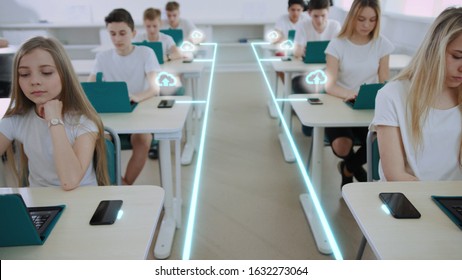 Visualization of Information. Digital Communication. In School Classroom Kids Students Studying by Computers. Technology Connecting Lines Flows into Global Network from Smartphones. Future Education. - Powered by Shutterstock