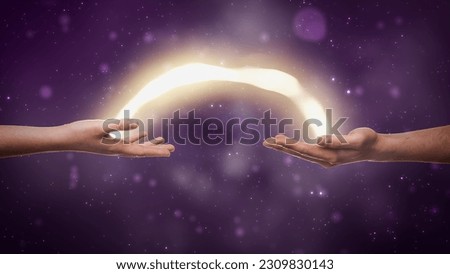 Visualization Of Two Hands Exchanging Bright Yellow Stream Of Magical Energy On Dreamy Dark Purple Background. Two People Spiritually Connecting, Charging Each Other With Esoteric Power Concept.