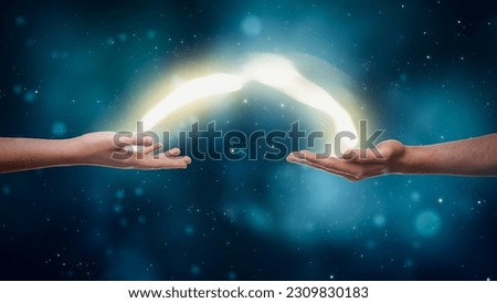 Visualization Of Two Hands Exchanging Bright Yellow Stream Of Magical Energy On Dreamy Dark Blue Background. Two People With Spiritual Connection Charging Each Other With Esoteric Power Concept