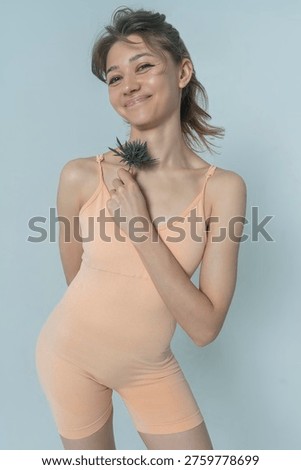 a visualization of a woman's self-perception, psychological state, positive emotions, female with a thistle flower