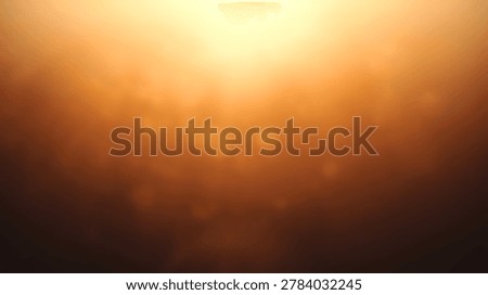 A visually appealing abstract gradient background featuring warm orange and yellow colors, creating a sense of depth and luminosity. Ideal for various design projects.