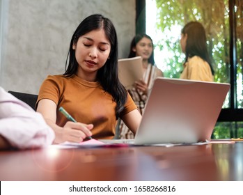 The Visually Impaired Woman Working At Office,with Serious Feeling,blurry Light Around