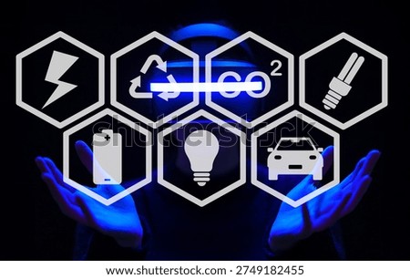 A visually striking representation featuring hands reaching out, adorned with icons highlighting renewable energy, technology solutions, and environmental awareness themes.