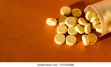 a vitamin B Complex pill that is yellow