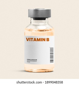 Vitamin B Injection In A Glass Bottle With Orange Liquid