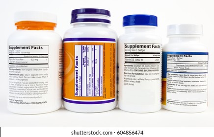 Vitamin Bottle Supplement Facts On Rear Labels.