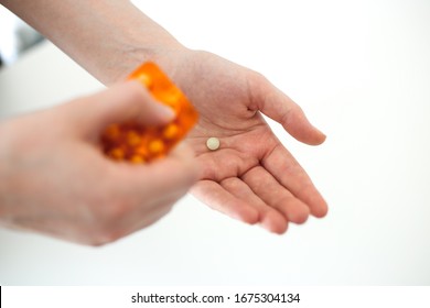 Vitamin C Pill On Hand Taking Care Of Your Health Supplement Dose 