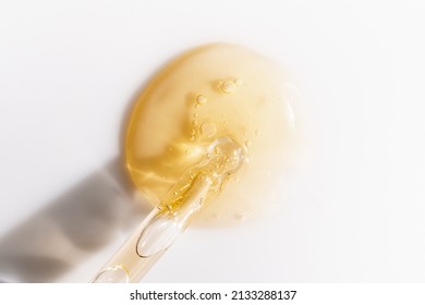 Vitamin C serum liquid texture with dropper, macro shot. - Shutterstock ID 2133288137