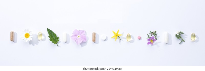 Vitamin capsules and dietary supplements isolated on with background. Panoramic format. - Shutterstock ID 2149119987
