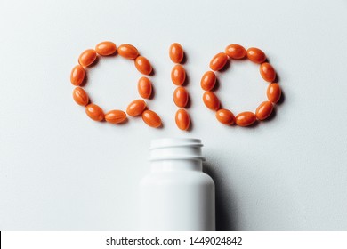 Vitamin Coenzyme Q10 On A White Background. To Prevent Aging. Pills And Medicine