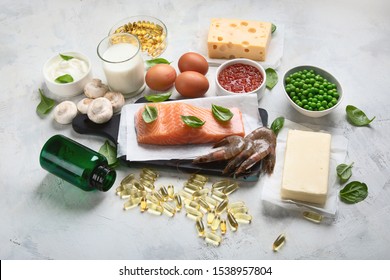 Vitamin D Foods And Capsulas. For Eye, Bone And Immune Systems Health, Blood Pressure Regulation. Against Cancer; Prevent Memory And Brain Decline; 